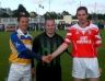 Referee Francis Traynor with two captain's Rasharkin's Michael Hasson and Loughgiel's Odhran Mc Fadden