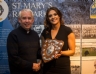 Fr. Brian O'Kane presents Amy McMullan with the McKillop shield for team of the year to U14 Manager Amy McMullan