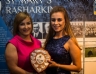 Kerrie Darragh recieves the Most Improved Camogie Player Award from Stacey Baird