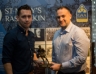 Cathal McMullan presents Gerard O'Hagan with the Reserve Footballer of the Year Award